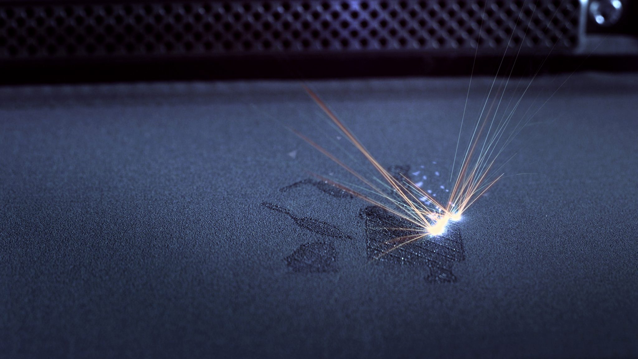 Laser powder bed fusion (LPBF) 3D printing in an EOS machine. Photo via EOS