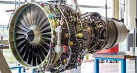 A jet engine undergoing overhaul at an MRO facility.