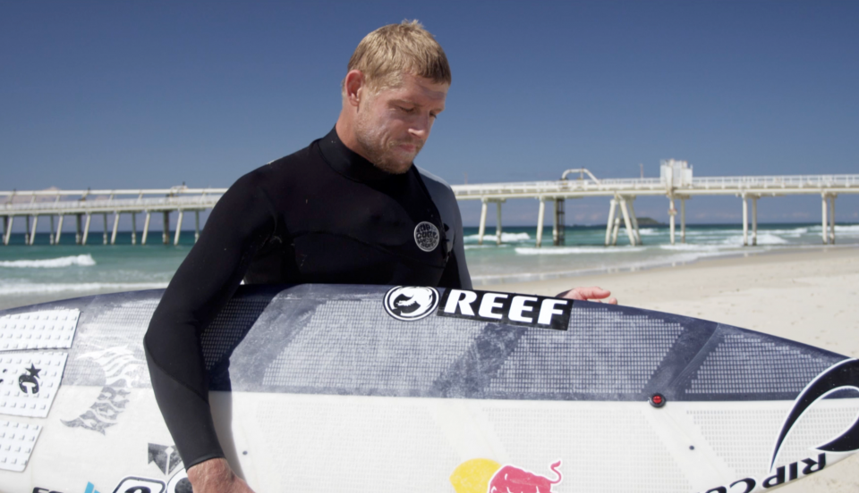 Mick Fanning and the Red Bull 3D rented surfboard prototype. Photo via the Red Bulletin