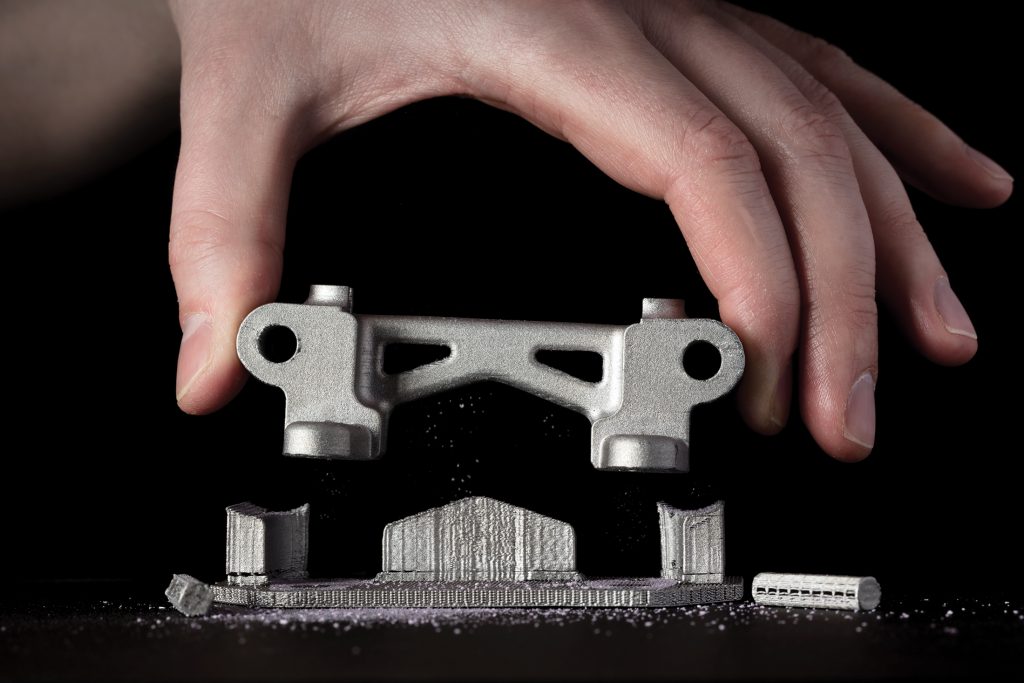 桌面金属3D打印零件几乎可以通过其支持墨水系统手动卸下。通过桌面金属照片