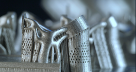 金属组件，3D印在构建板上的Sintavia机器中。通过Sintavia的照片。