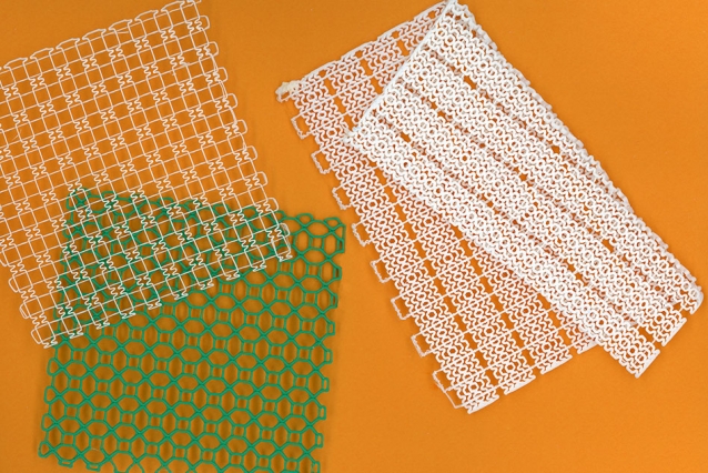 3D printed stretchy mesh, with customized patterns designed to be flexible yet strong, for use in ankle and knee braces. Photo via Felice Frankel/MIT.