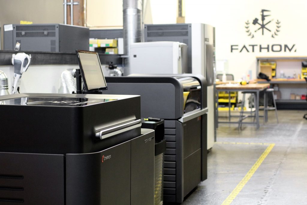 A selection of 3D printers part of FATHOM's expansive technology offering. Photo via FATHOM