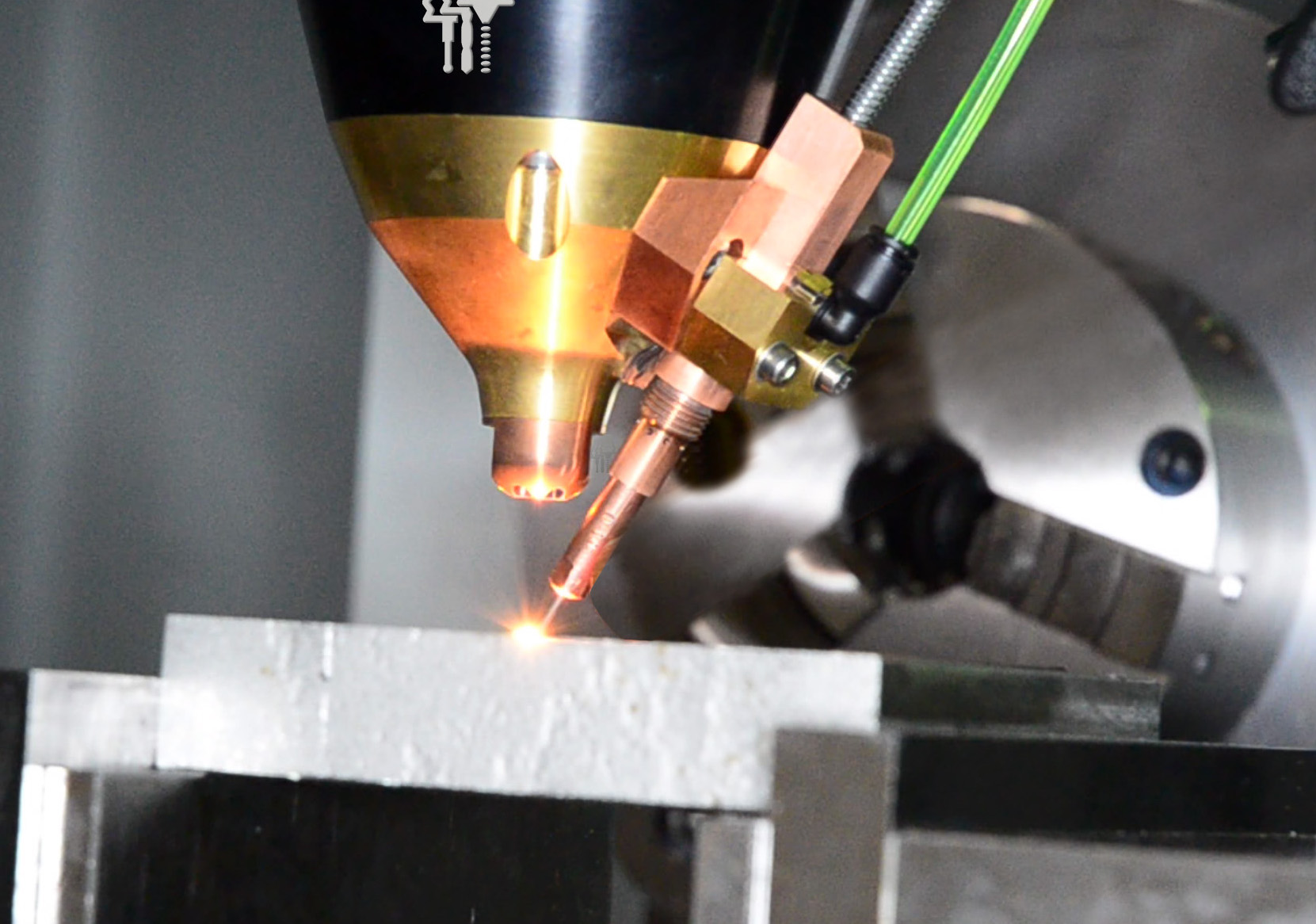 HMT has partnered with TWI and Epoch to develop a new wire feed system for laser 3D printing. Photo via HMT.